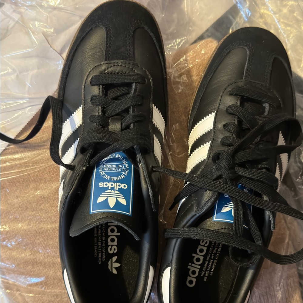 Adidas OG samba in black.